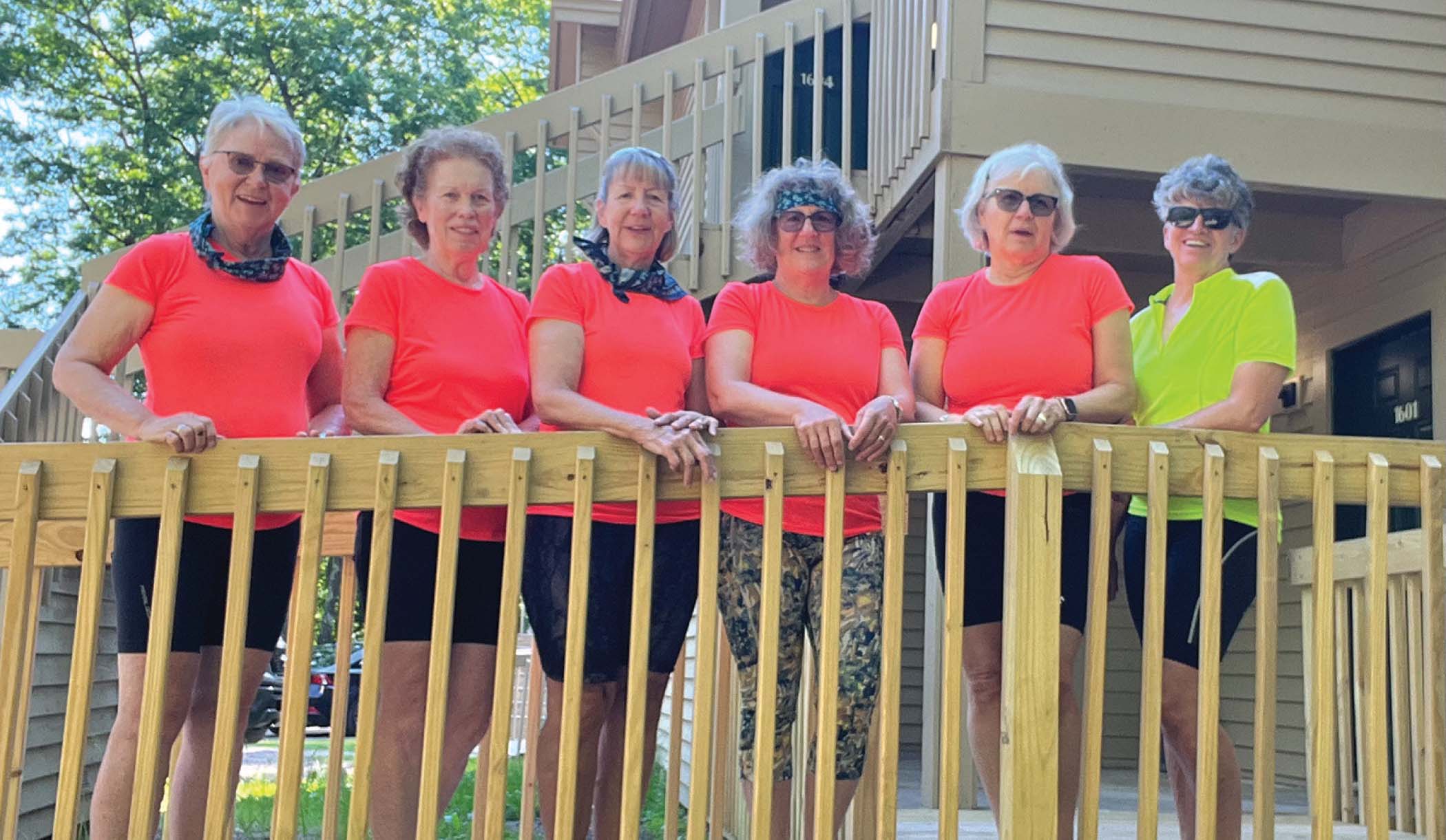 Nancy Sojka stands with a group of women she bikes with