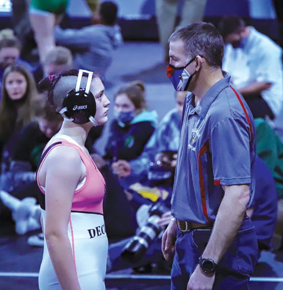 Naomi Simon talks with Coach Fullhart before the State finals match in 2021. / Photo courtesy Melissa Simon
